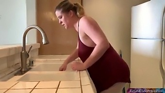 A Mature Woman And A Young Man Engage In Sexual Activity In The Kitchen